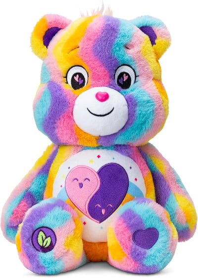 Colorful teddy bear with heart designs on a white background