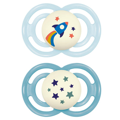 Two baby pacifiers with space-themed designs on a white background