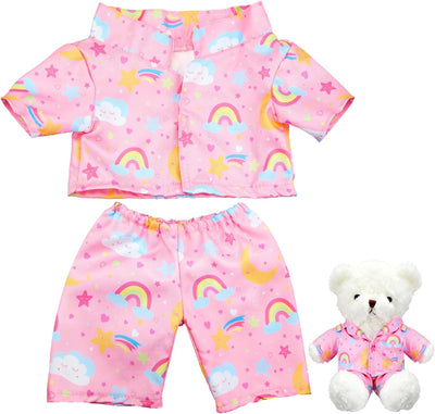 Pink children's pajama set with rainbow and cloud patterns, including a teddy bear wearing the same outfit.
