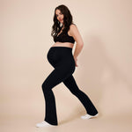 Motherhood Maternity Women's Essential Full Length Secret Fit Over The Belly Flare Pregnancy Yoga Pants, Black, Medium