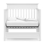 Storkcraft Petal 4-in-1 Convertible Mini Crib (White) – GREENGUARD Gold Certified, Converts to Daybed and Twin-Size Bed, Bonus 2.75-inch Mini Crib Mattress Included, Ideal for Small Spaces