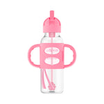 Pink sippy cup with clear body on a white background