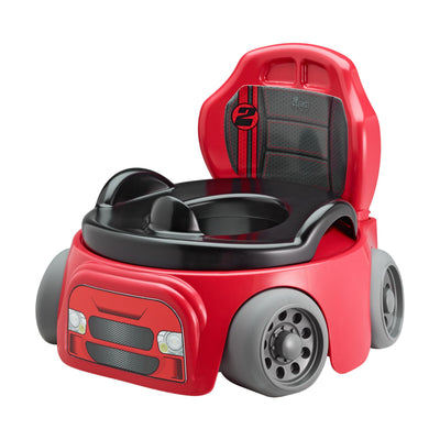 Red and black children's potty chair designed like a car on a white background