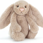 Plush bunny toy on a white background