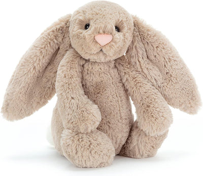Plush bunny toy on a white background