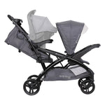Baby Trend Sit N' Stand Tandem Double Stroller w/ 2 Pack EZ-Lift Plus Infant Car Seats, Magnolia