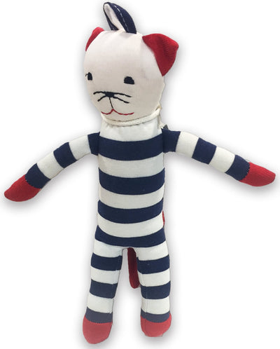 Stuffed toy cat in a striped outfit with red paws and ears on a white background