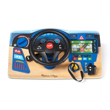 Toy car dashboard with steering wheel and controls on a white background