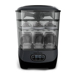 Black baby bottle sterilizer with digital display on a white background