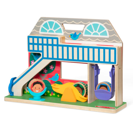 Colorful wooden playhouse toy with slide and windows on a white background