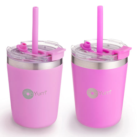 Two pink tumblers with straws and lids on a white background