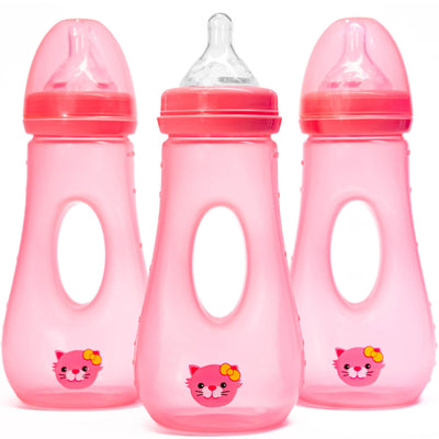 Three pink baby bottles with cartoon cat faces on a white background