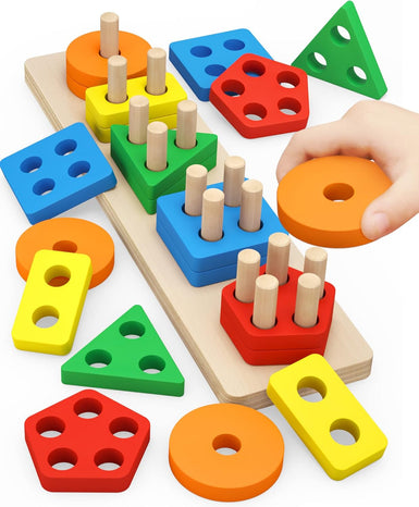 Colorful geometric shape sorting toy with wooden pegs on a white background