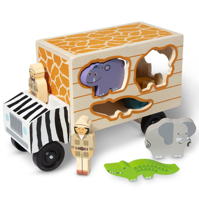 Wooden toy truck with animal cutouts and figures on a white background
