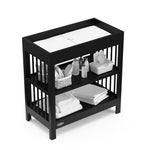 Graco Teddi Changing Table with Water-Resistant Changing Pad (Black) - GREENGUARD Gold Certified, Includes Bonus Water-Resistant Changing Pad with Safety Strap, 2 Shelves, Easy-to-Match