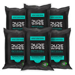 Multiple packages of Dude Wipes Mint & Chill on a white background