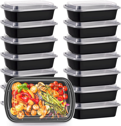 Set of black food containers with one containing food on a white background