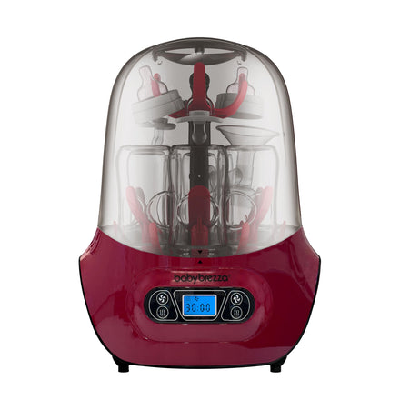Red and clear baby bottle sterilizer with digital display on a white background