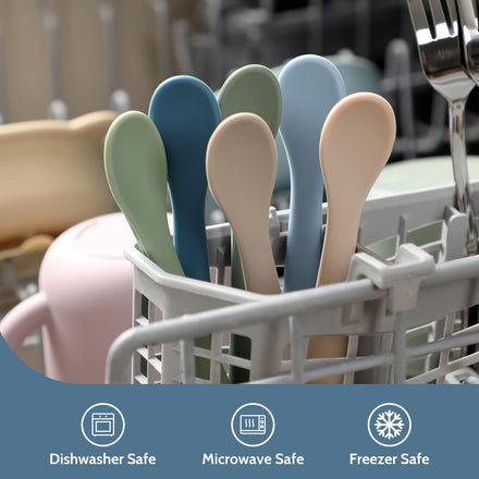 Colorful spoons in a dishwasher rack with safety icons at the bottom.
