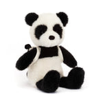 Stuffed panda toy on a white background