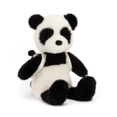 Stuffed panda toy on a white background
