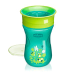 Green and blue sippy cup with frog design on a white background