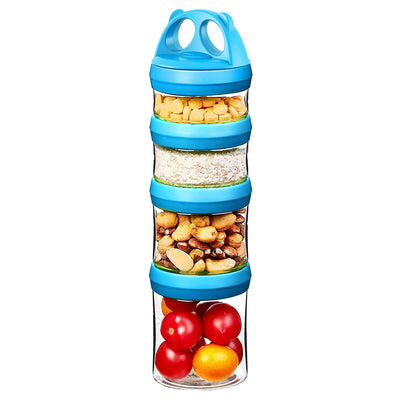 Stackable container with compartments filled with snacks on a white background