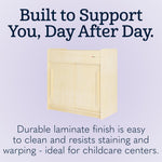 Foundations SafeGlide Daycare Changing Table, Durable Wood Construction, Built-in Shelving for Ample Storage, Gliding Doors, Adjustable Safety Strap, Includes Foam Mattress Pad (Natural)
