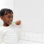 Ubbi Toddler Training Toothbrush Set, Soft Bristled & Gentle Manual Toothbrushes for Baby, Green Zest & Smoothie Purple