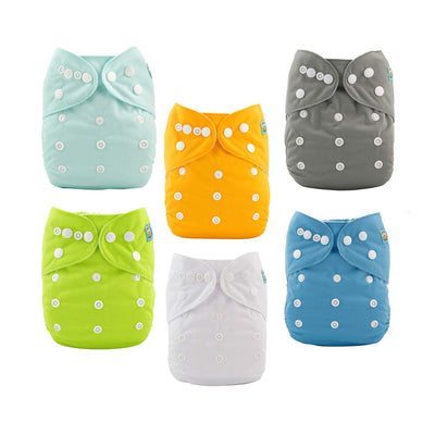 Set of six colorful cloth diapers with button closures on a white background