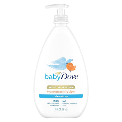 Baby Dove sensitive skin care lotion bottle on a white background