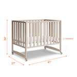 MAMAZING EvoNook 6-in-1 Convertible Mini Crib, 100% New Zealand Wood, Portable Mini Cribs with Wheels for Small Spaces, GREENGUARD Gold Certified, Washed Natural