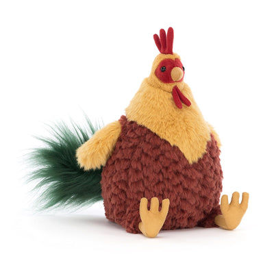 Plush rooster toy on a white background