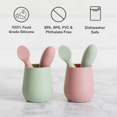 Two silicone cups with spoons, featuring safety certifications on a white background.
