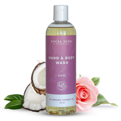 Bottle of Socal Suds & Company hand and body wash with coconut and rose elements on a white background