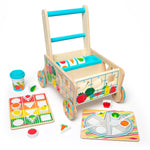 Wooden toy walker with colorful educational elements on a white background