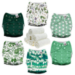 Set of green and white patterned cloth diapers with a roll of white cloth on a white background