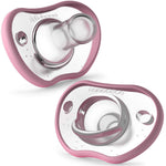 Two pink and clear baby pacifiers on a white background