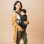 Baby Tula Lite Ripstop Nylon Compact Baby Carrier, Lightweight & Ergonomic Carrier for Travel w/Convenient Storage Hip Pouch, Multiple Carrying Positions for 12lbs to 30lbs - Discover (Black/Stars)