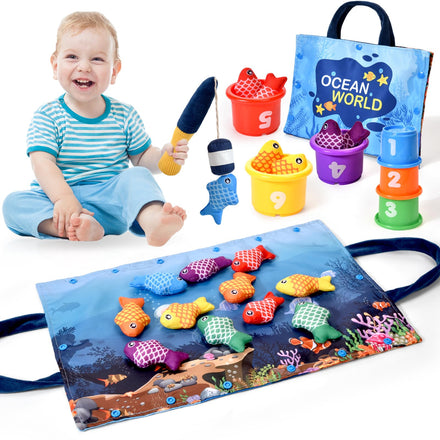 Child playing with colorful fishing toys and accessories on a white background