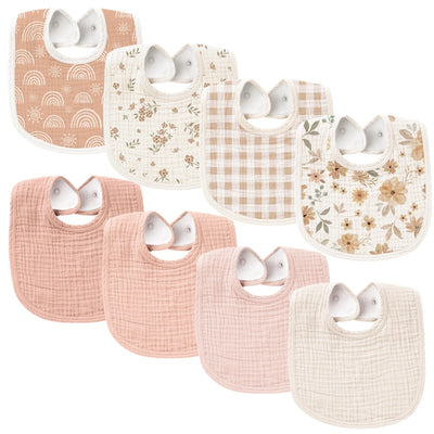 Set of baby bibs with various patterns on a white background