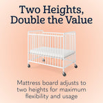 Foundations Chelsea Clearview Metal Compact Daycare Crib, 3" Casters, Compact Mini Size, Easy to Clean Durable Finish, Adjustable to Two Heights Mattress Board (White)