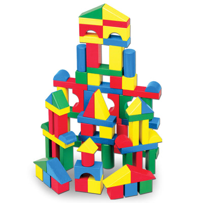 Colorful building blocks stacked into a tower on a white background
