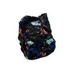 Black diaper with colorful pattern on a white background