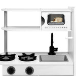 Delta Children Deluxe Modern Kitchen - Toy Kitchen Playset with Realistic Knobs that Turn/Click, Oven, Sink and Fridge/Freezer with Ice Maker, White