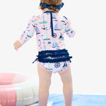RuffleButts Baby Girls UPF 50+ Sun Protection Novelty Print Long Sleeve One Piece Rash Guard Swimsuit with Zipper - Pink Sweet Sails, 3-6m