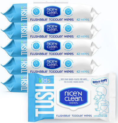 Multiple packages of Tush nice'n clean flushable toddler wipes on a white background