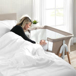 Delta Children Bondi Adjustable Height Bedside Beechwood Bassinet with PureAir Mesh Sheet and FSC-Certified Wood, Tan