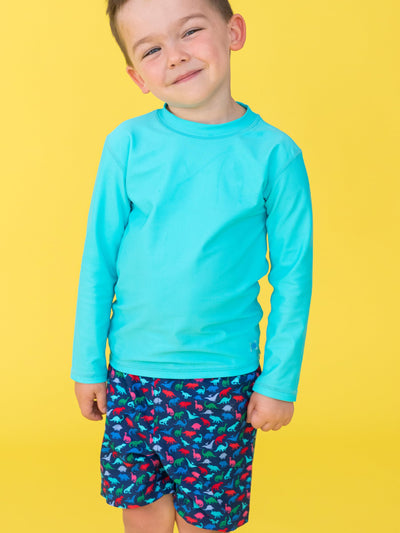 RUGGEDBUTTS Boys UPF50+ Sun Protection Animal Swim Trunks - Navy Dino Roar, 12-18m