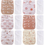 Set of baby cloth diapers with various patterns on a white background